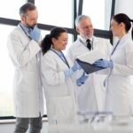 medium-shot-scientist-together